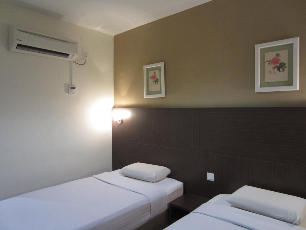 Radiant Hotel Sitiawan Quarto foto