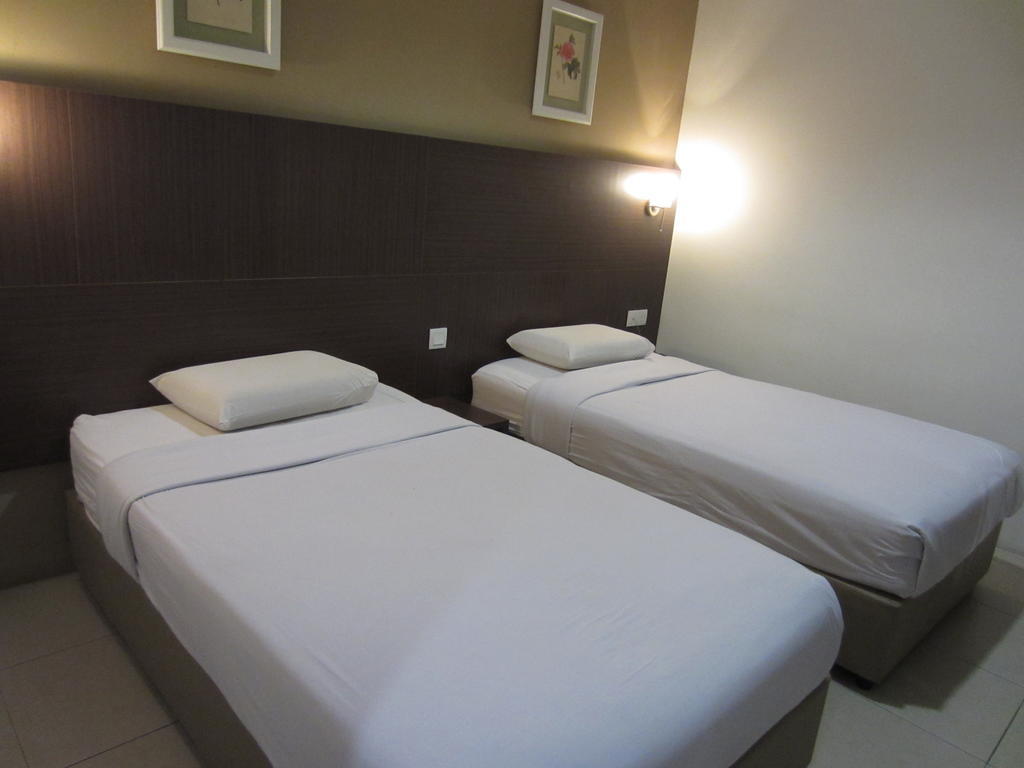 Radiant Hotel Sitiawan Quarto foto